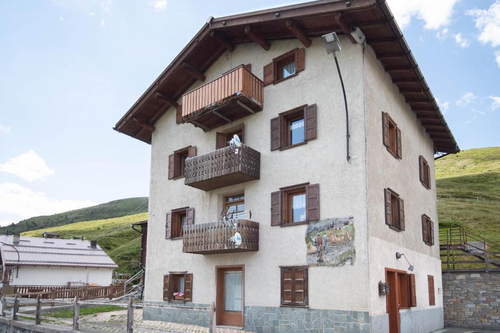 a building with balconies on the side of it at The WoodHouse in Livigno