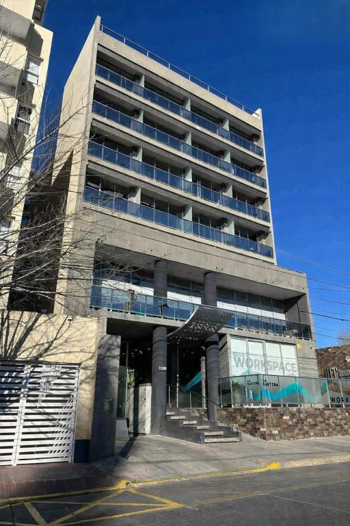 a large office building with a lot of windows at DFC by FMA Coliving in Salta