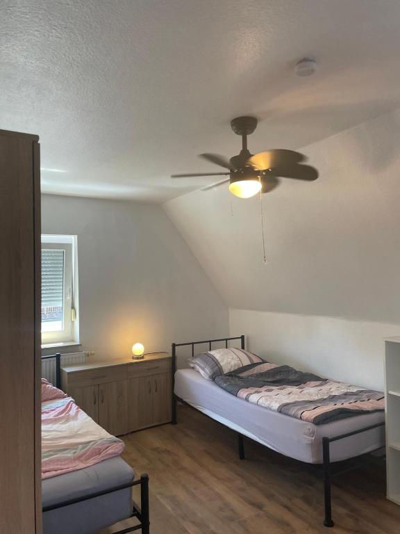 Llit o llits en una habitació de Stadtmitte Kitzingen