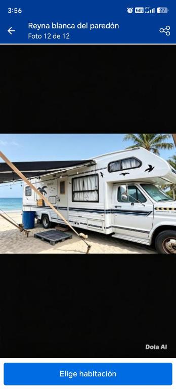 a white rv being hooked up to a trailer at White Queen in El Paredón Buena Vista