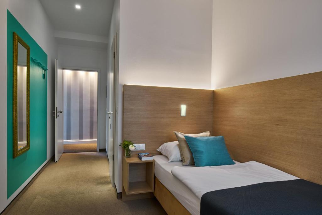 Postel nebo postele na pokoji v ubytování Hotel 38