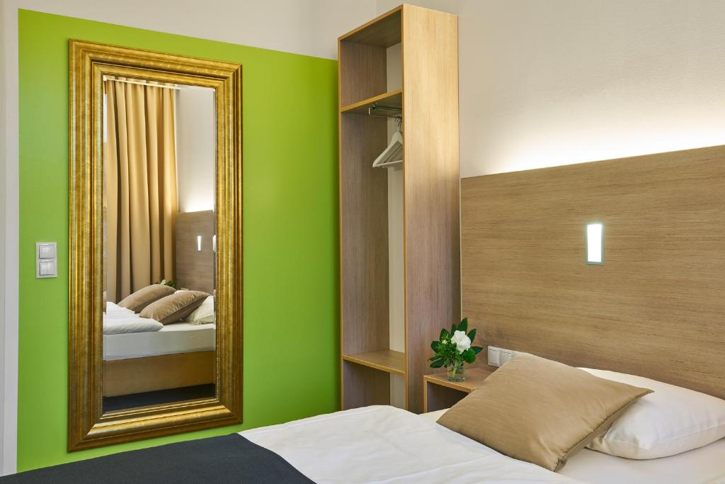 Postel nebo postele na pokoji v ubytování Hotel 38