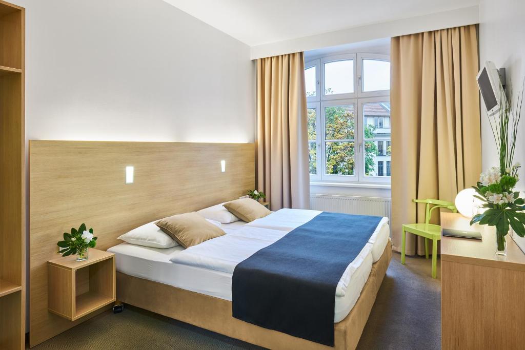 Postel nebo postele na pokoji v ubytování Hotel 38
