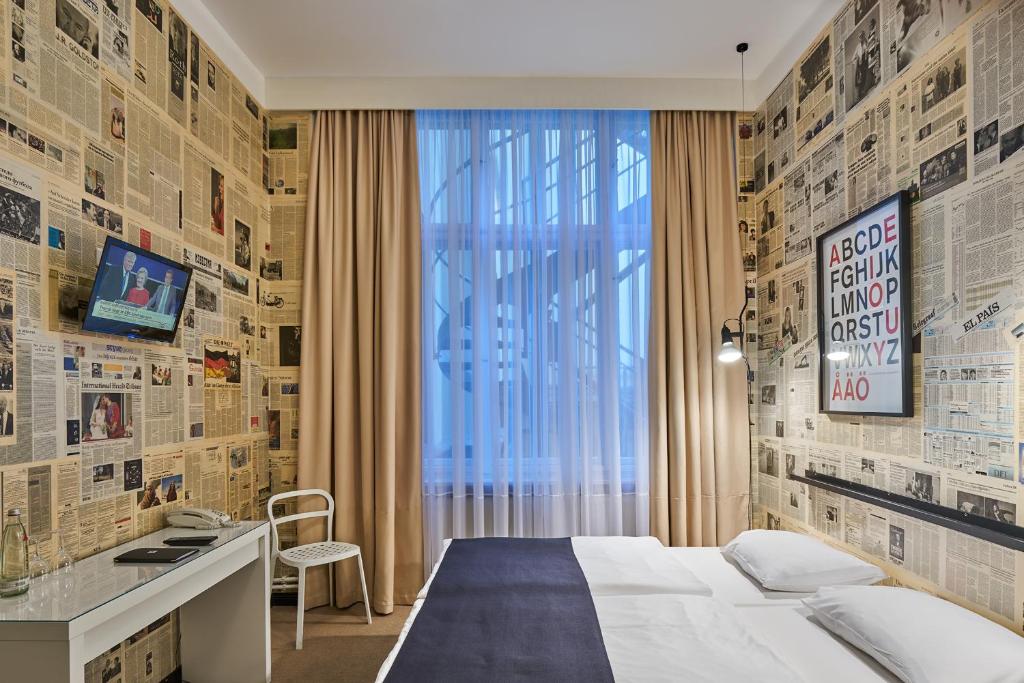 TV a/nebo společenská místnost v ubytování Hotel 38