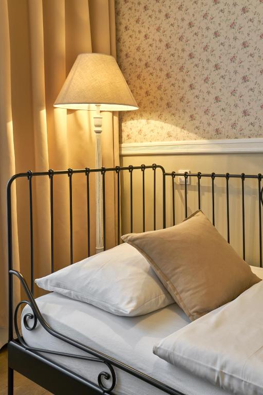 Postel nebo postele na pokoji v ubytování Hotel 38
