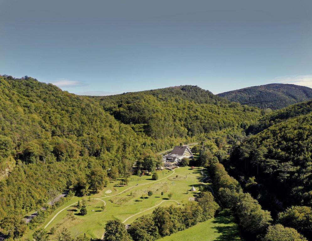 an aerial view of a valley in the mountains at Hotel Krainerhütte in Baden