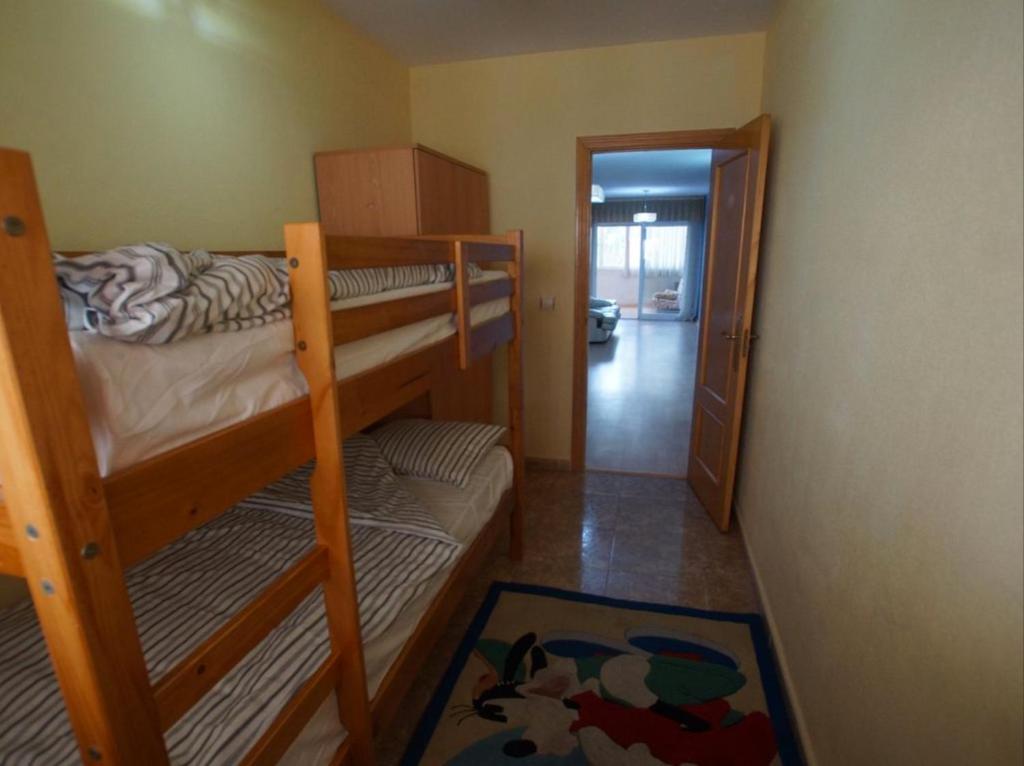 Posteľ alebo postele v izbe v ubytovaní Albamar Apartment
