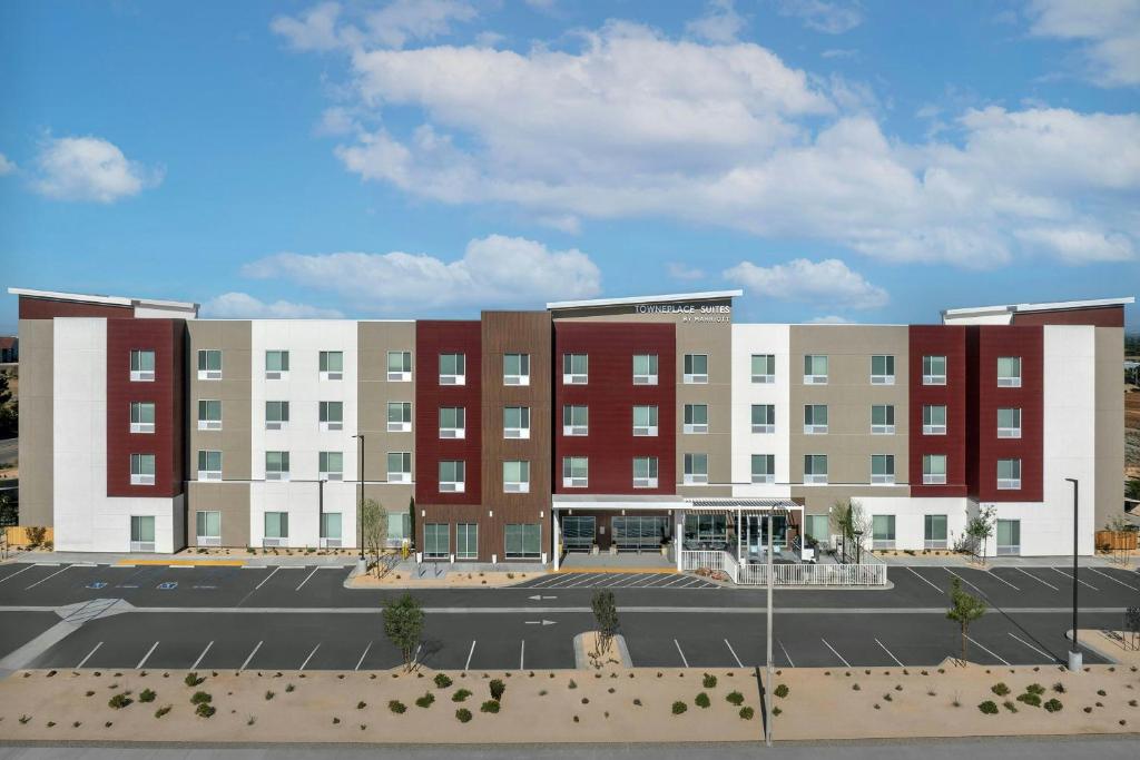 a large building with a parking lot in front of it at TownePlace Suites by Marriott Palmdale in Palmdale