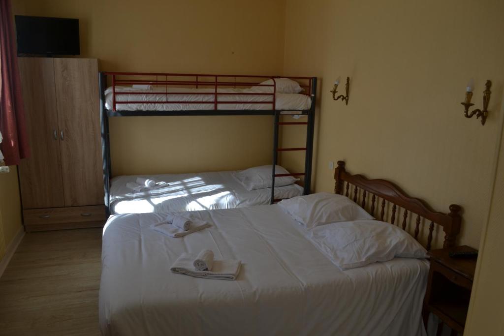 Postel nebo postele na pokoji v ubytování Le Lanthenay