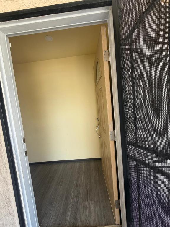 an open door to a room with a hallway at Alvin Relax in El Cajon