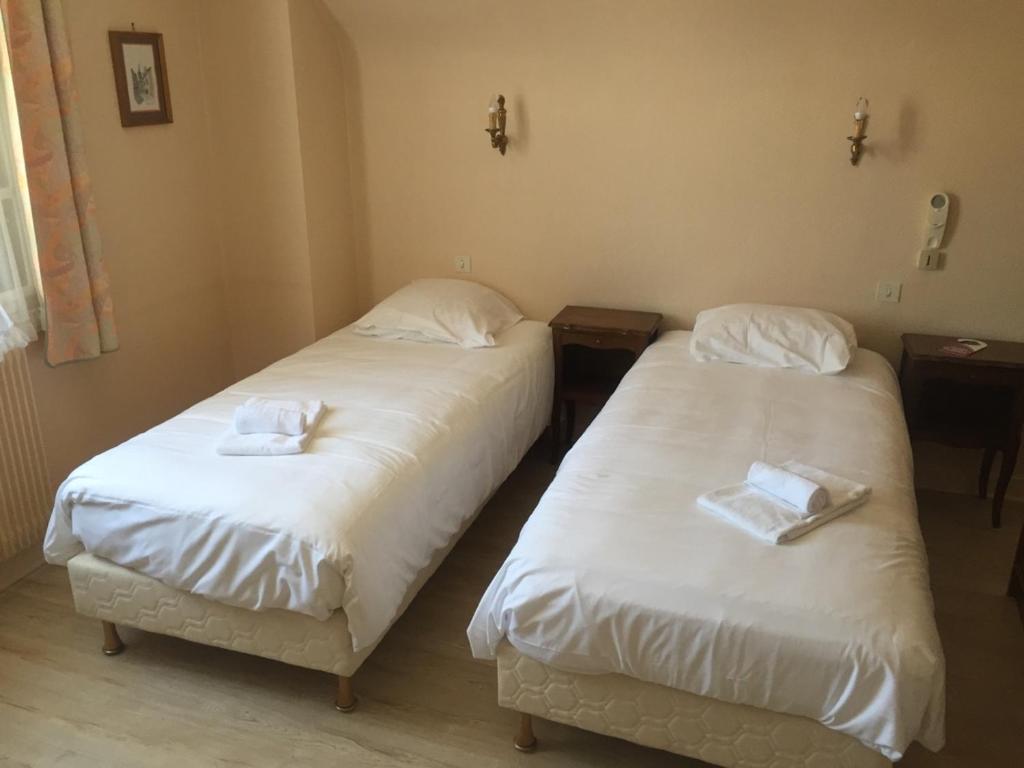 Postel nebo postele na pokoji v ubytování Le Lanthenay