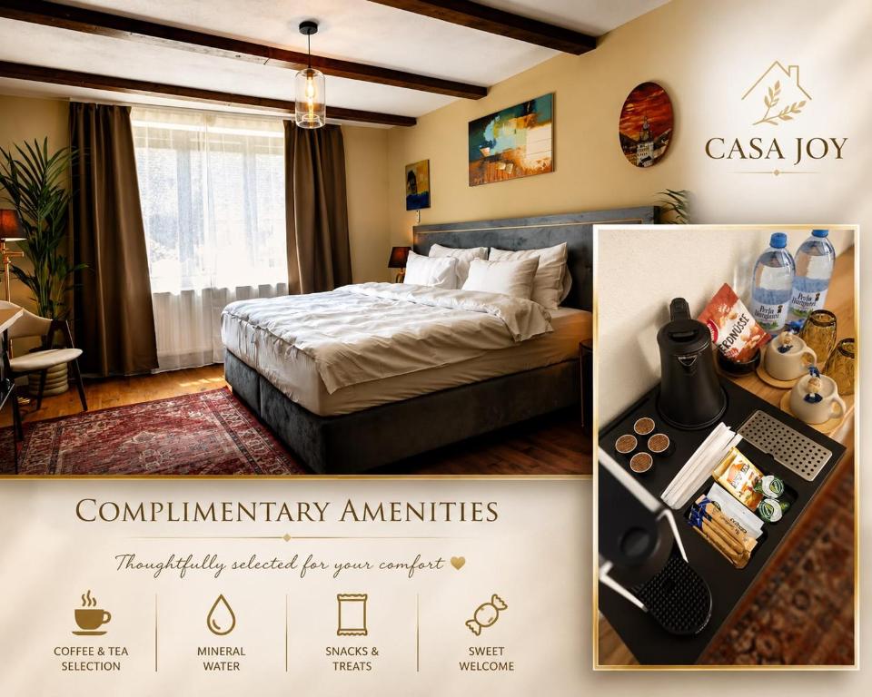 a hotel room with a bed and a desk at Casa Joy Sighisoara in Sighişoara
