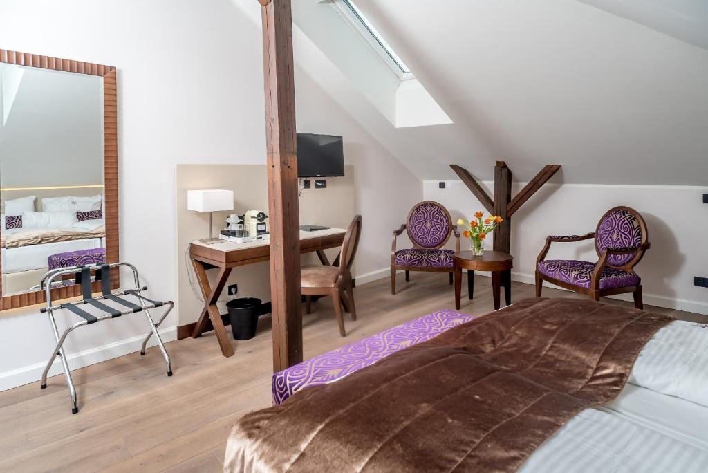 Posteľ alebo postele v izbe v ubytovaní Boutique Hotel Adria