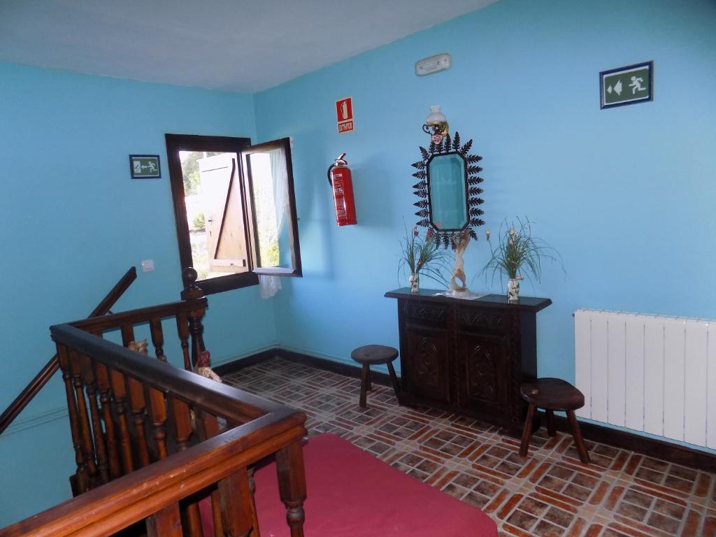 A seating area at Posada La Ceña