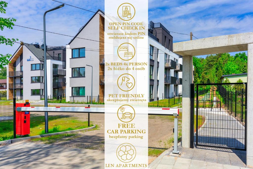 a sign that reads free car parking in front of a building at Len Apartments One Gdańsk Sobieszewo Baltic Line blisko morza na Wyspie Sobieszewskiej dla rodzin przyjazny zwierzętom z tarasem in Gdańsk