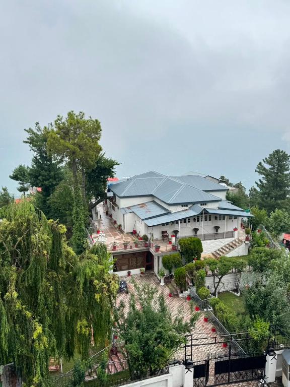 an aerial view of a large building with a roof at Velenburg Retreat in Upper Topa