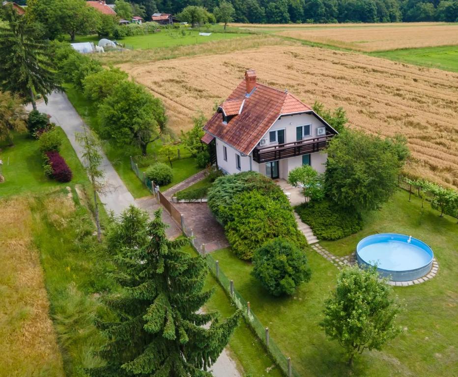 an aerial view of a house with a swimming pool at D&J house in Ormoz