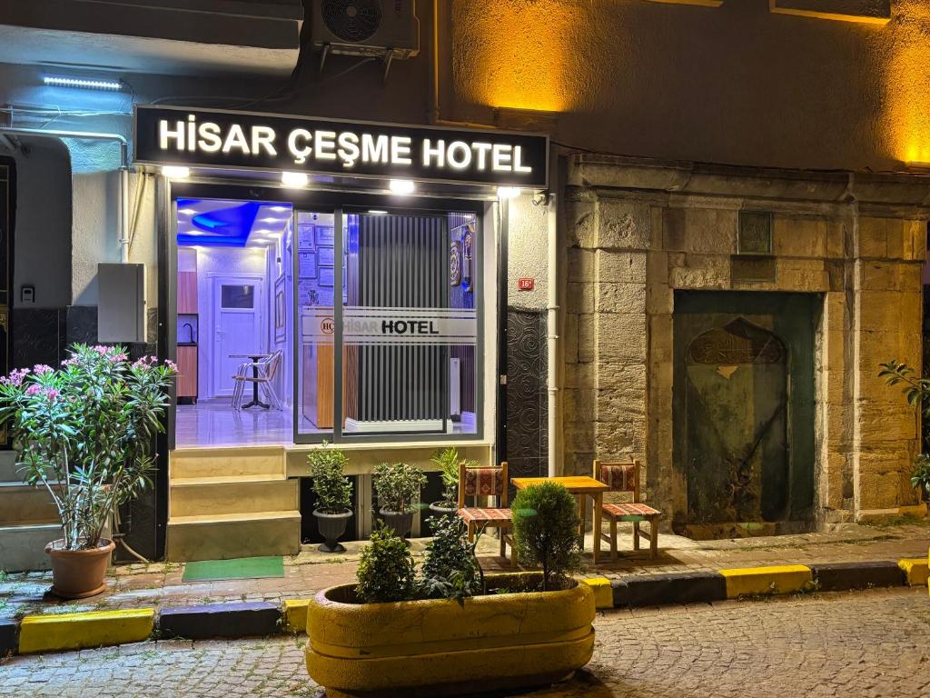 an entrance to a versace hotel at night at Hisar Çeşme Hotel in Istanbul