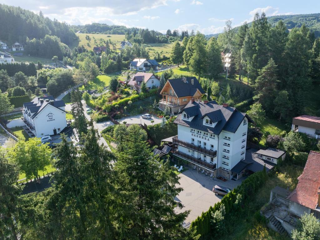 an aerial view of a large building in a village at Sarenka in Krynica Zdrój