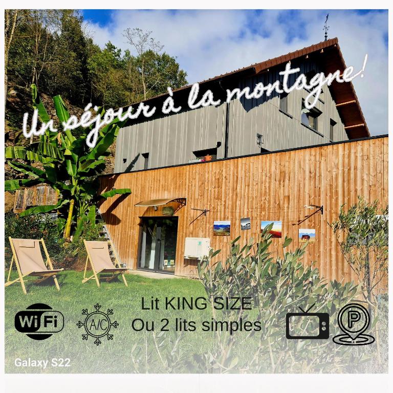 a sign for a building with two chairs in front of it at Le Chalet de Pyrène et Hercule in Arignac
