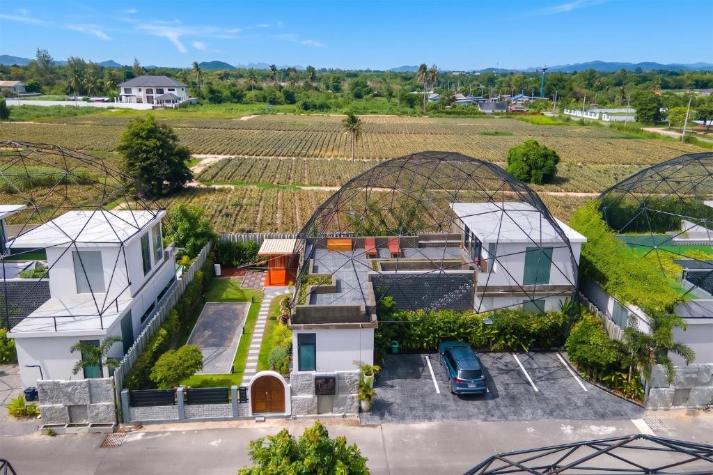 an aerial view of a house with domes at Sawasdee pool villa, Hua Hin in Hua Hin