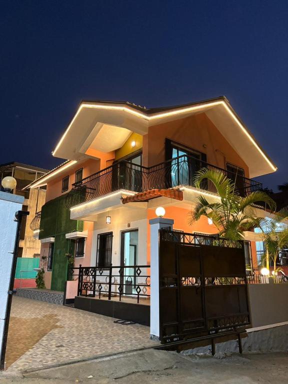 a large house with a fence in front of it at Cinnamon Villa - The Dream Stays ll Pvt Pool ll 3Ac Rooms ll Wi-Fi in Khandāla