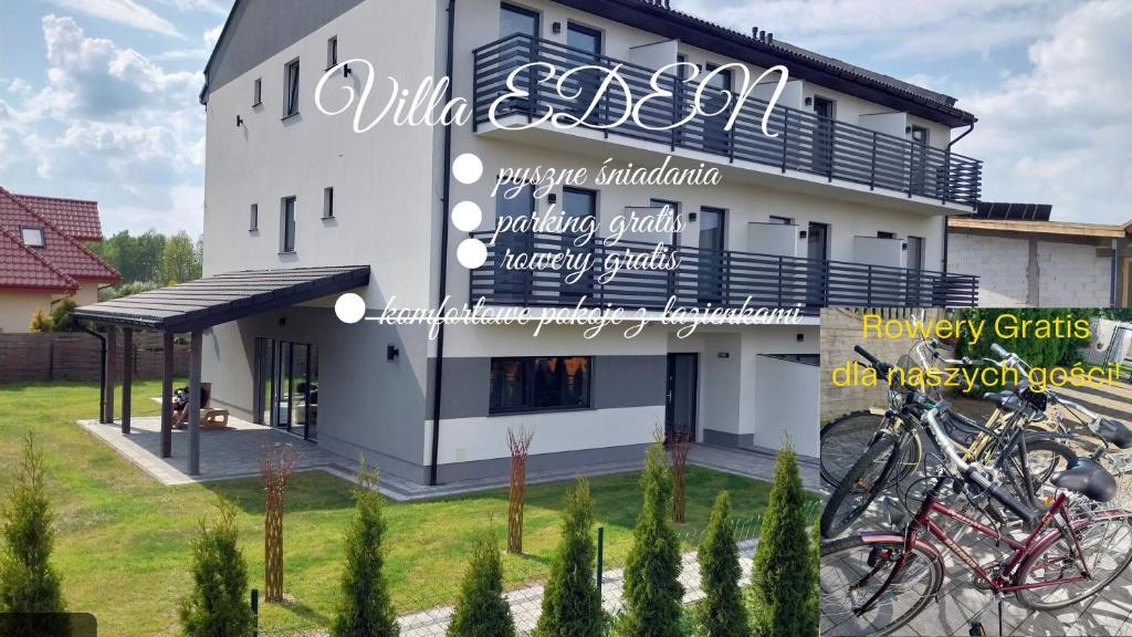 a building with bikes parked outside of it at VILLA EDEN USTKA- CENISZ SOBIE CISZĘ I BŁOGI SPOKÓJ, WYPOCZYNEK tylko DLA DOROSŁYCH, POKOJE Z BALKONAMI I TARASAMI,PARKING W CENIE ! in Ustka