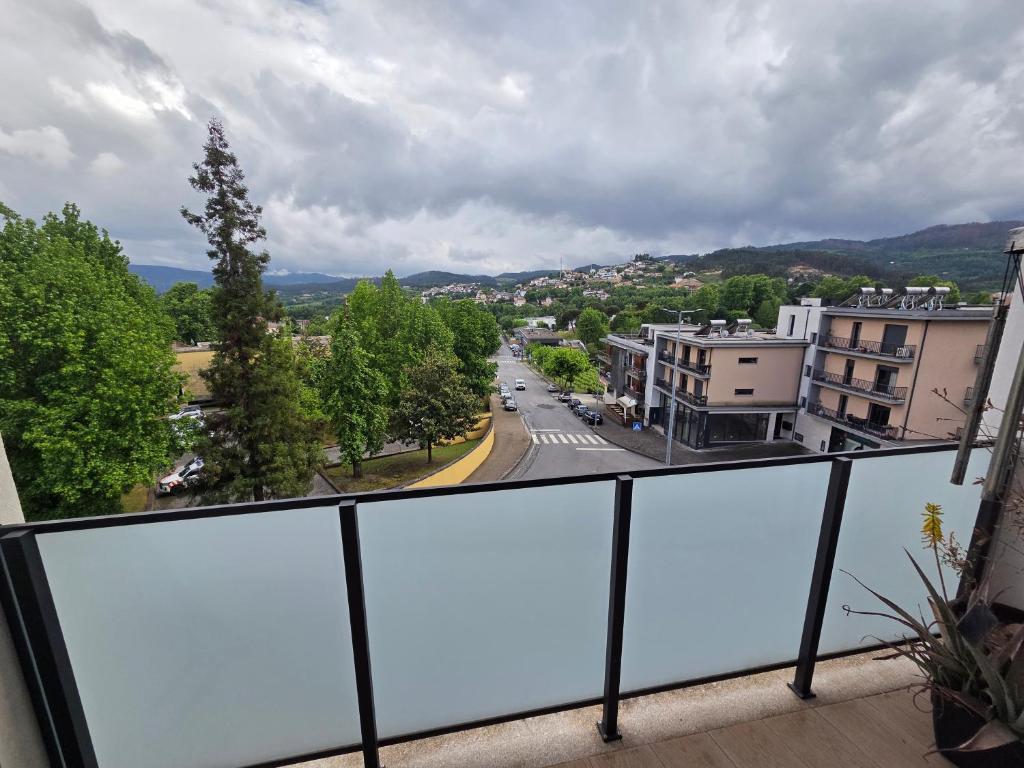 a view of a city from a balcony at Paisagem&Charme in Celorico de Basto