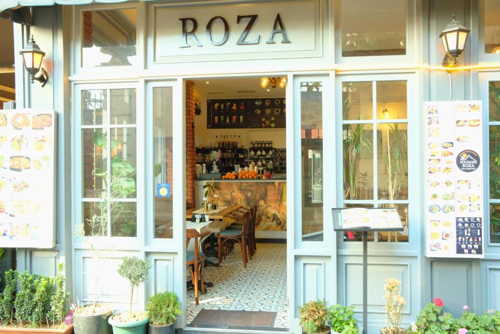 a restaurant with a table in the front of it at Roza Taksim in Istanbul