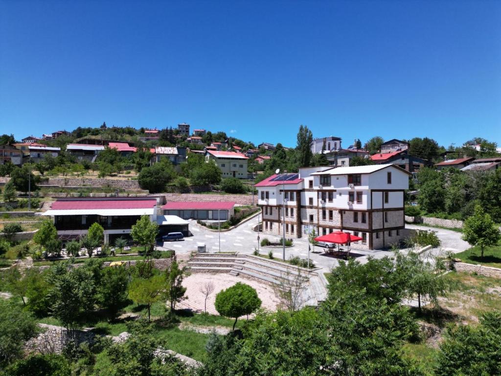 an aerial view of a building in a town at Kaşkaloğlu Hotel in Arapkir