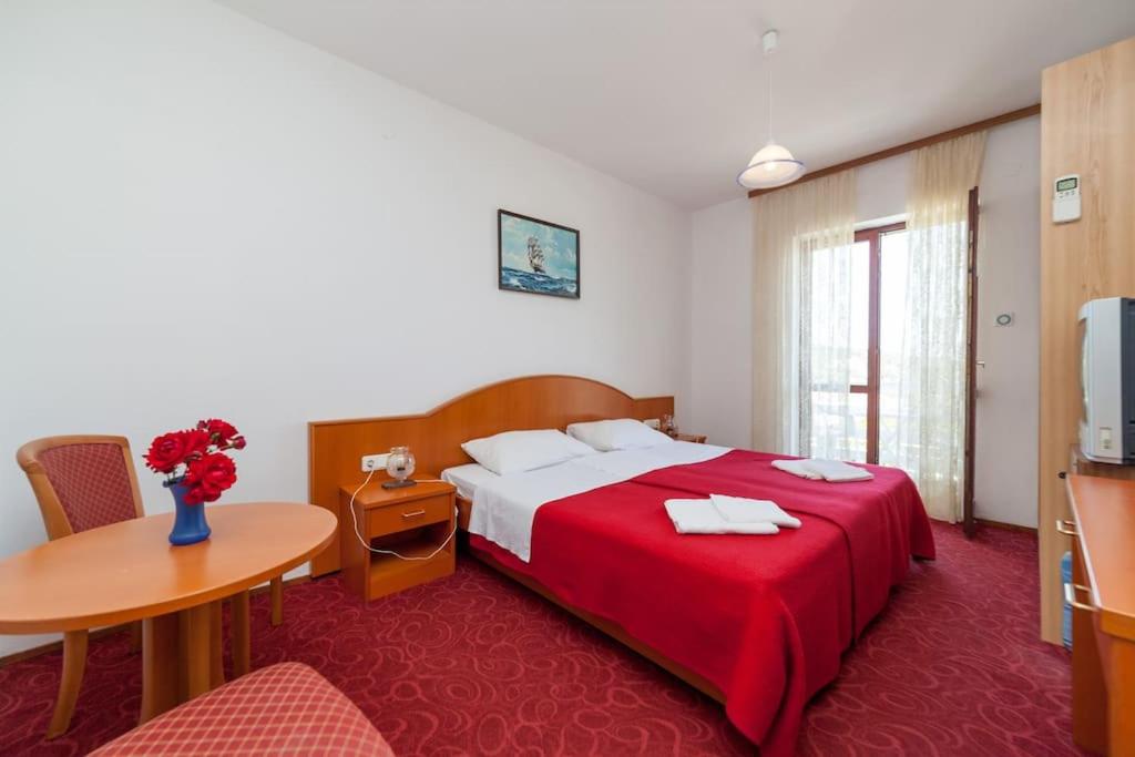 Postel nebo postele na pokoji v ubytování Villa Pincevic
