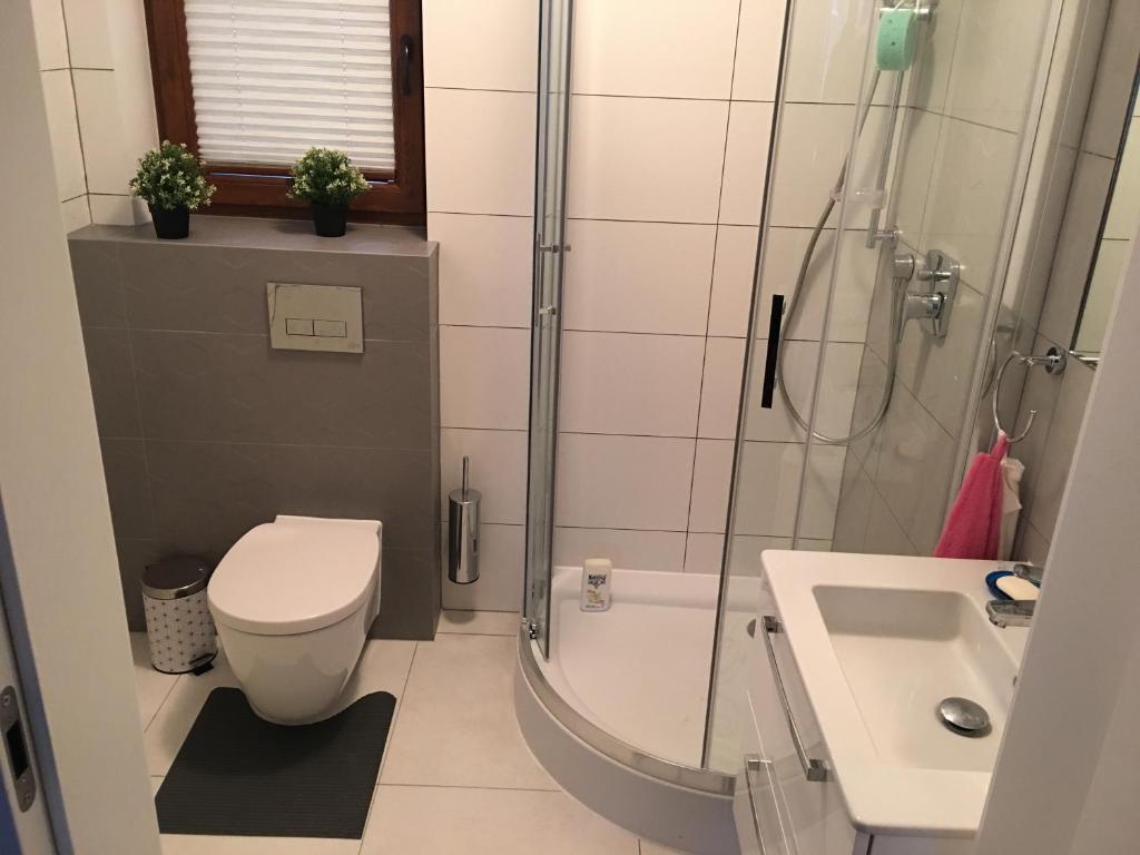 Kúpeľňa v ubytovaní Apartament Danusia