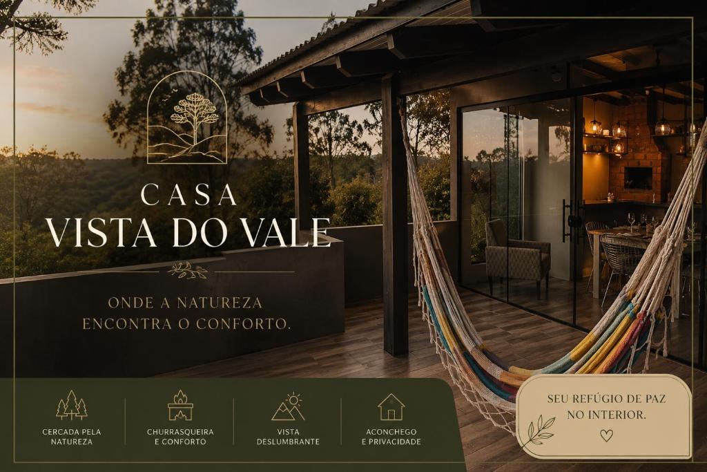 a sign that reads casa vista do villa with a hammock at Casa vista do Vale in Farroupilha