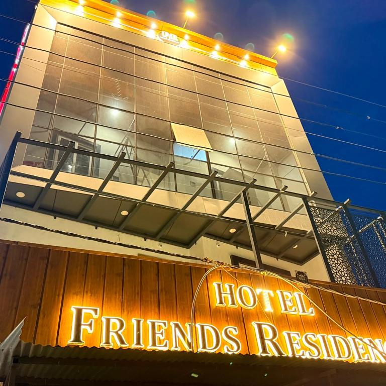 a hotel with a sign on the front of a building at Hotel Friends Residency in Bijaipur