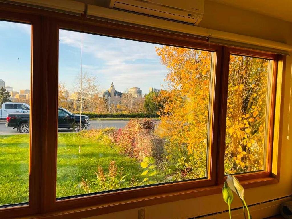a window with a view of the fall foliage at H on the bund in Saskatoon