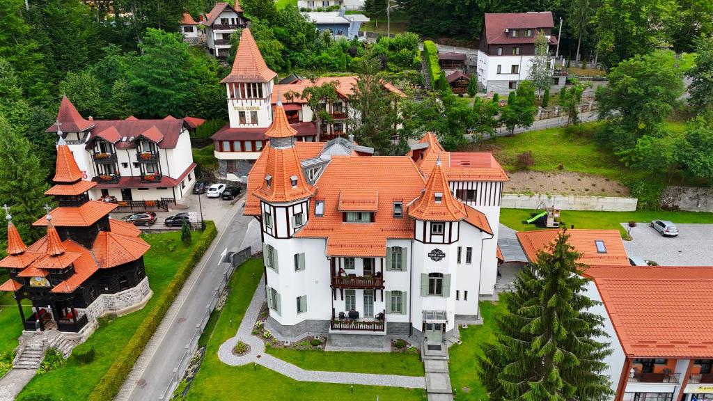 an aerial view of a large house with an orange roof at Turul Villa in Sovata