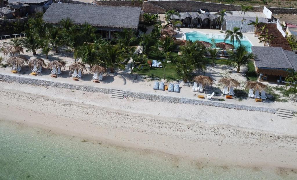 an aerial view of a resort on the beach at SIQUIJOR - THE SEANDYOU Resort in San Juan