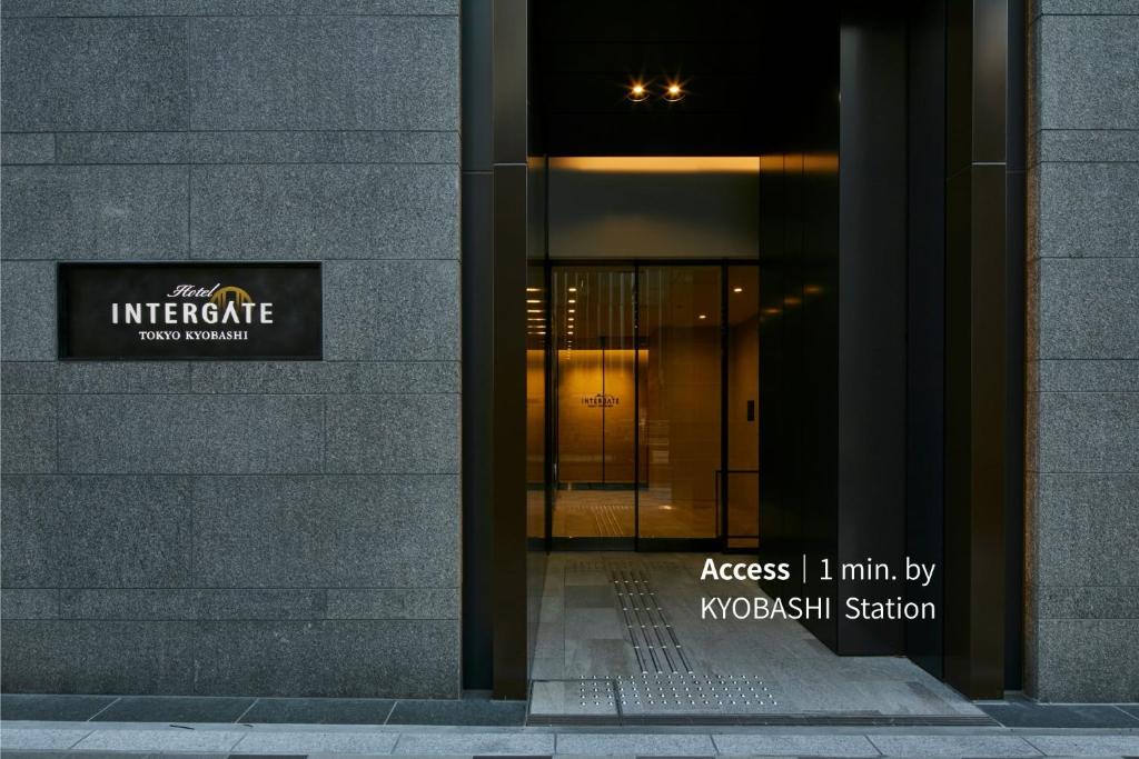 an entrance to a building with a sign on it at Hotel Intergate Tokyo Kyobashi in Tokyo