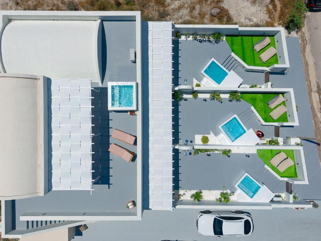an overhead view of a building with a pool at Caldera's Elements in Santorini