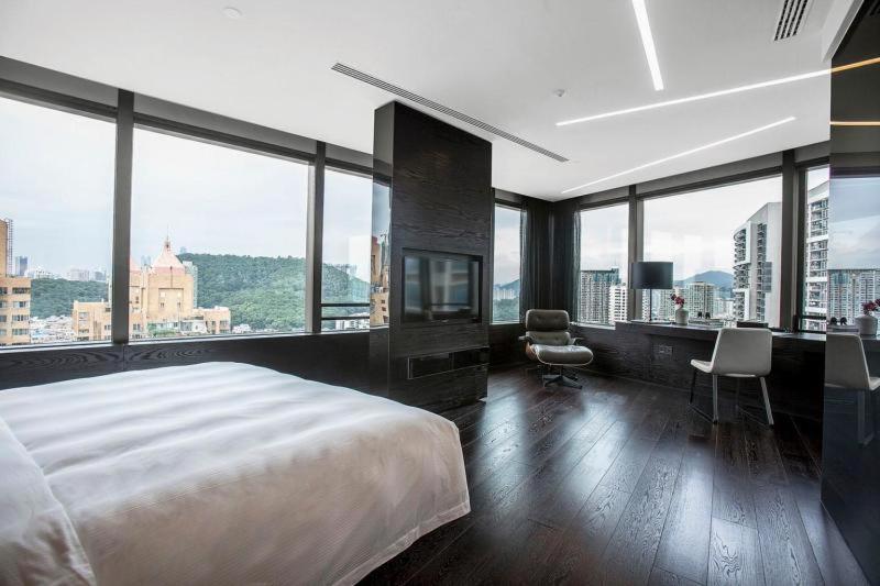 Postel nebo postele na pokoji v ubytování Shenzhen O Hotel