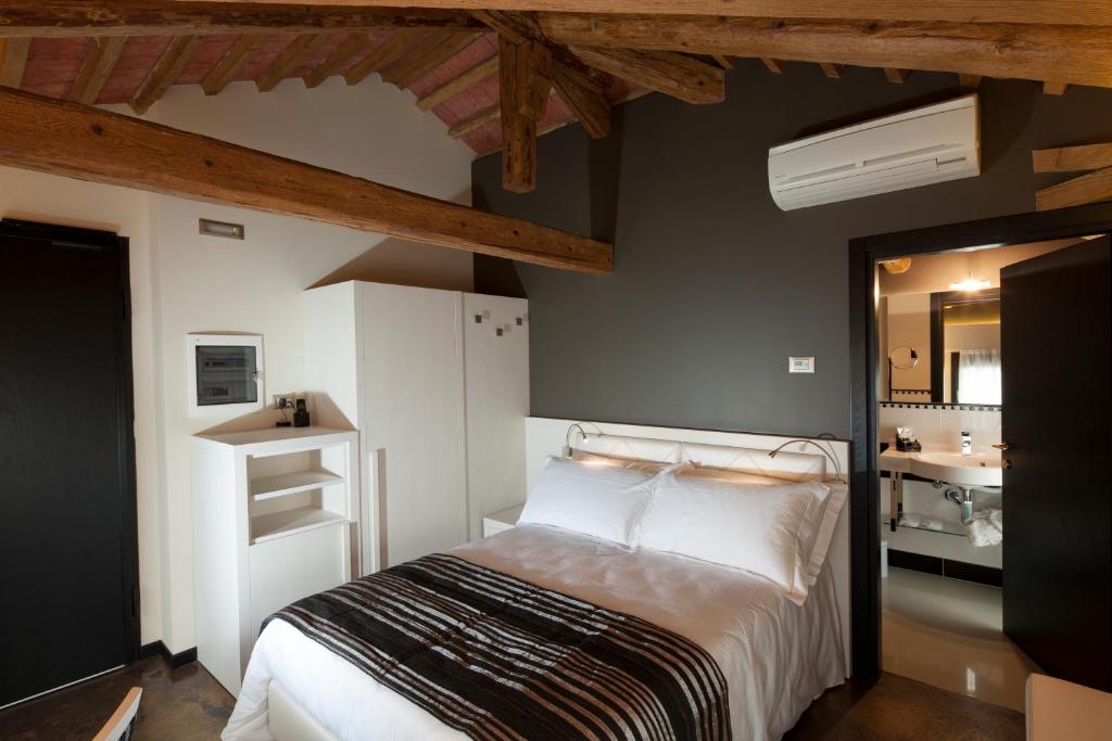 Postel nebo postele na pokoji v ubytování Villa Solaris Hotel & Residence