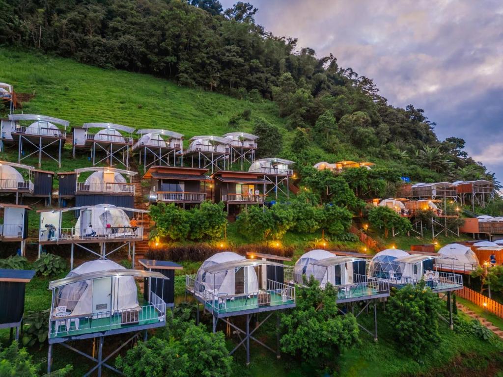 an aerial view of a resort with tents on a hill at Mon P Monjam in Mon Jam