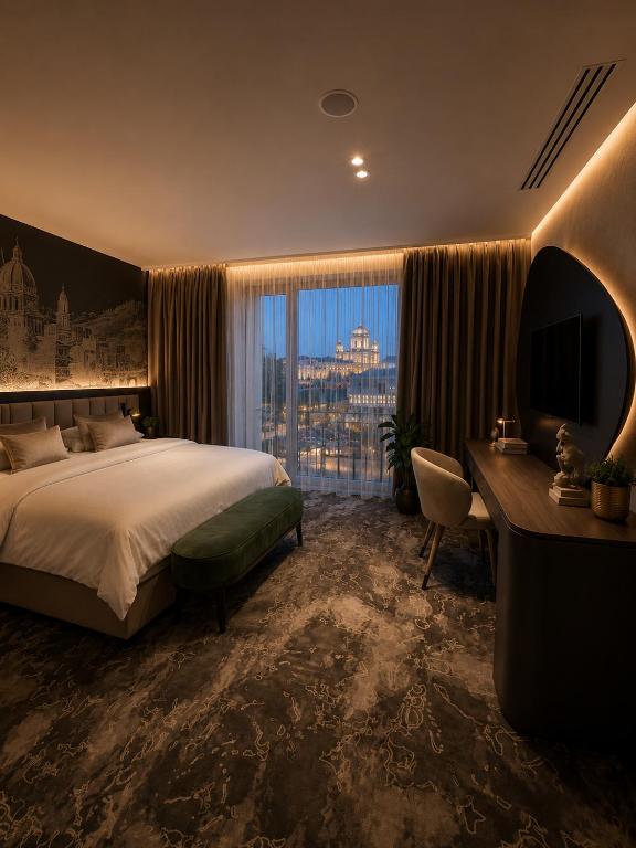 En eller flere senge i et værelse på GW Danube Hotel