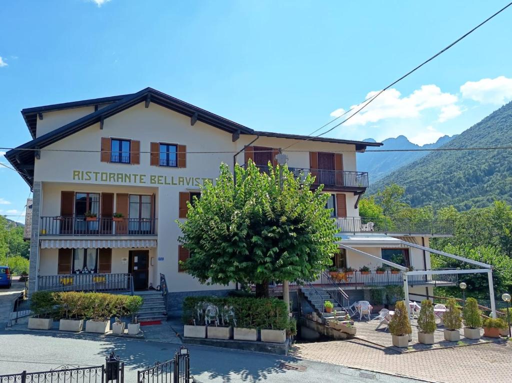 a building with a tree in front of it at Albergo Bellavista in Re