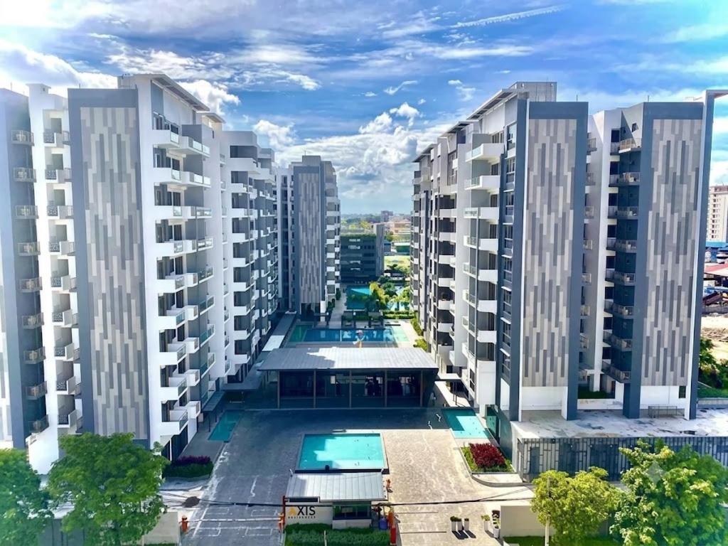 an aerial view of apartment buildings in a city at Axis Residences By The Team in Phnom Penh