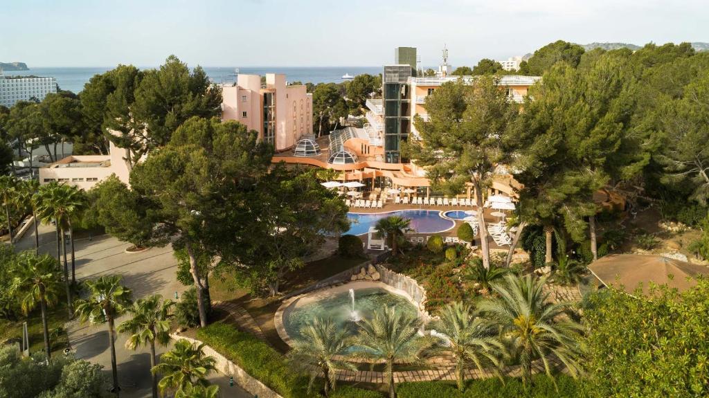 an overhead view of a city with a pool and trees at Ona Palmira Paguera in Paguera