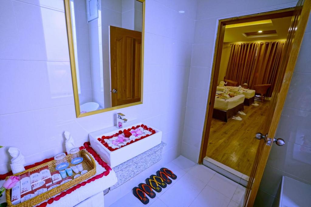 Postel nebo postele na pokoji v ubytování The Hotel Nova