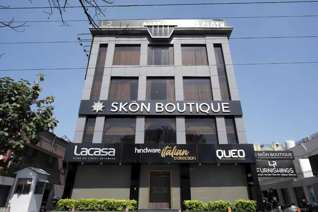 a building with a sign for a sushi boutique at Skon Boutique by Orion Hotels in Delhi