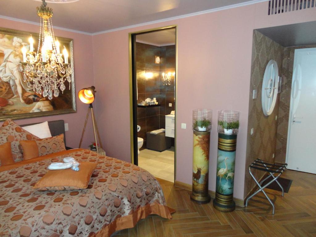 Letto o letti in una camera di Art Of Dreams Deluxe 4 stars