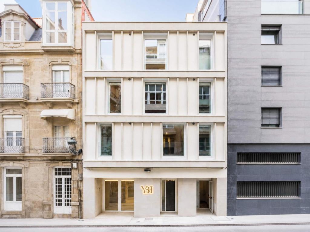 an apartment building with the number on it at YBH Atlantic Boutique in Vigo